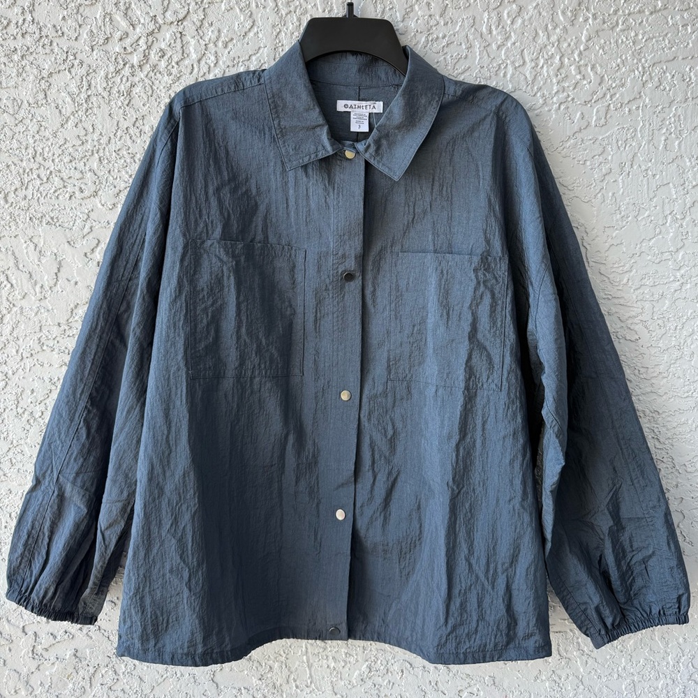 Athleta Lunar Sheen Shirt in the Dark Rinse color size Small